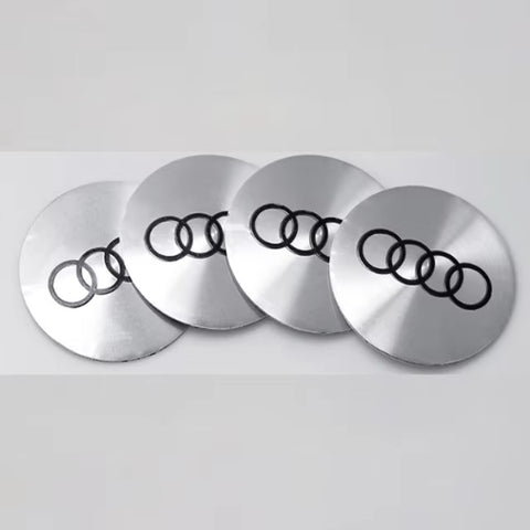 PEGATINA PARA CENTRO DE RUEDA AUDI COLORES NEGRO Y PLATA JUEGO DE 4 PIEZAS TAMAÑO A ELEGIR MEDIDAS EXTERIORES DE 56 Y 65MM